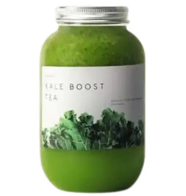 A glass jar of HeyTea Kale Boost Tea made with fresh kale and green tea