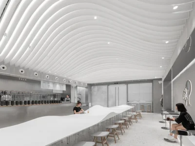 Interior of Heytea Daydreamer showcasing a futuristic white wave ceiling, minimalist seating, and a serene, dreamlike tea space.